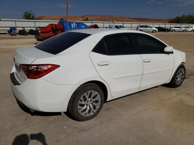 Photo 2 VIN: 5YFBURHE7KP891463 - TOYOTA COROLLA L 