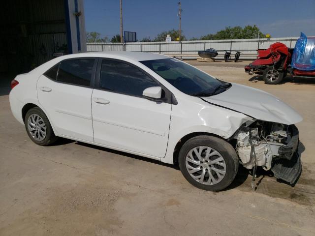 Photo 3 VIN: 5YFBURHE7KP891463 - TOYOTA COROLLA L 