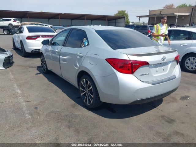 Photo 2 VIN: 5YFBURHE7KP892144 - TOYOTA COROLLA 