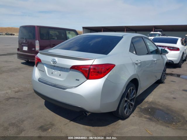 Photo 3 VIN: 5YFBURHE7KP892144 - TOYOTA COROLLA 