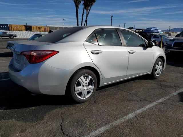 Photo 2 VIN: 5YFBURHE7KP894508 - TOYOTA COROLLA L 