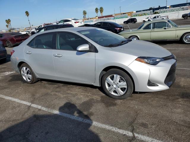 Photo 3 VIN: 5YFBURHE7KP894508 - TOYOTA COROLLA L 