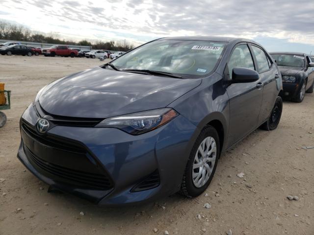 Photo 1 VIN: 5YFBURHE7KP898560 - TOYOTA COROLLA L 