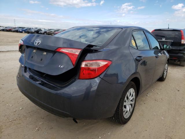 Photo 3 VIN: 5YFBURHE7KP898560 - TOYOTA COROLLA L 