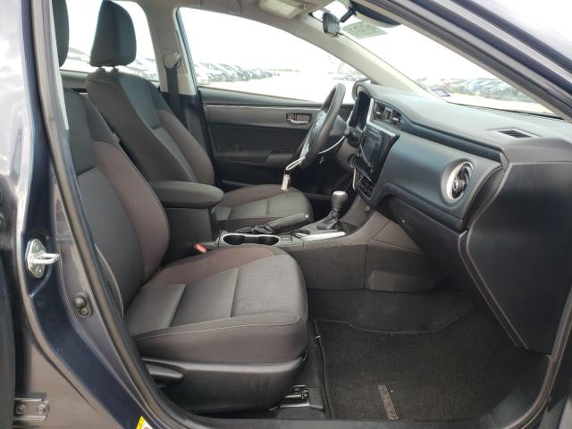 Photo 4 VIN: 5YFBURHE7KP898560 - TOYOTA COROLLA L 