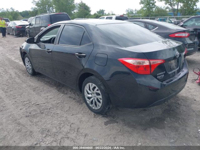 Photo 2 VIN: 5YFBURHE7KP899448 - TOYOTA COROLLA 