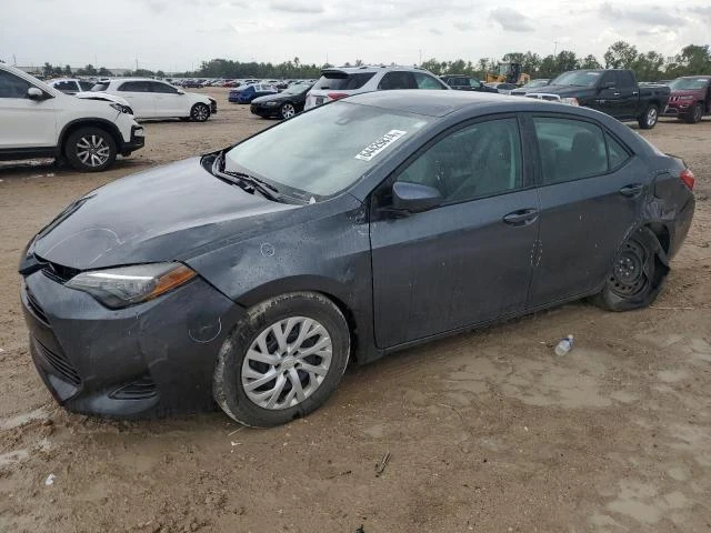 Photo 0 VIN: 5YFBURHE7KP899451 - TOYOTA COROLLA L 