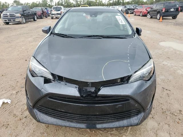 Photo 4 VIN: 5YFBURHE7KP899451 - TOYOTA COROLLA L 