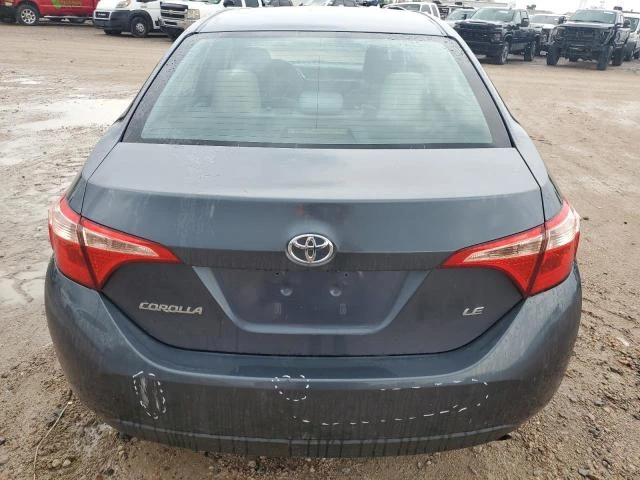 Photo 5 VIN: 5YFBURHE7KP899451 - TOYOTA COROLLA L 