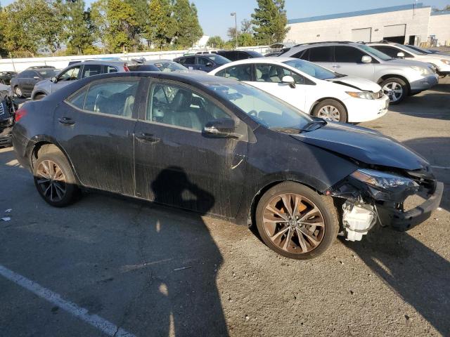 Photo 3 VIN: 5YFBURHE7KP900386 - TOYOTA COROLLA L 