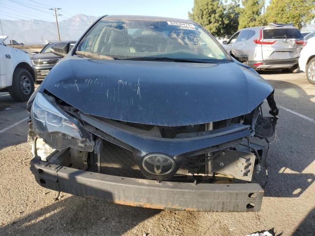 Photo 4 VIN: 5YFBURHE7KP900386 - TOYOTA COROLLA L 