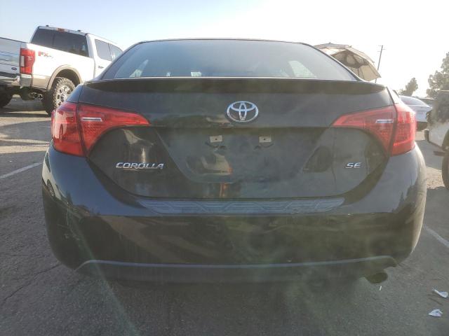 Photo 5 VIN: 5YFBURHE7KP900386 - TOYOTA COROLLA L 