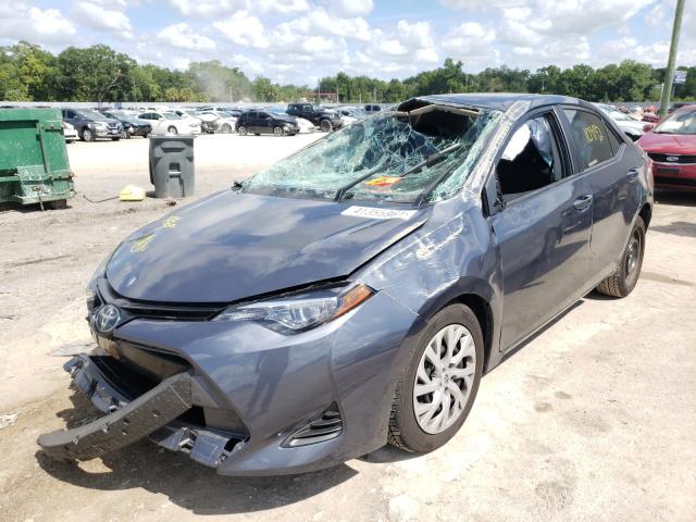 Photo 1 VIN: 5YFBURHE7KP904390 - TOYOTA COROLLA L 