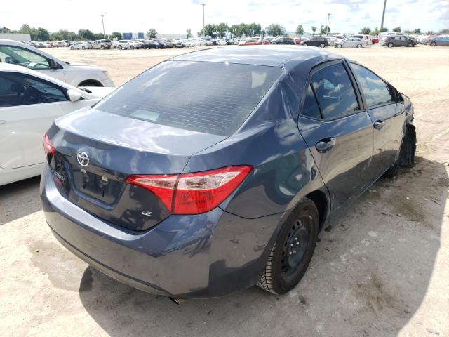 Photo 3 VIN: 5YFBURHE7KP904390 - TOYOTA COROLLA L 