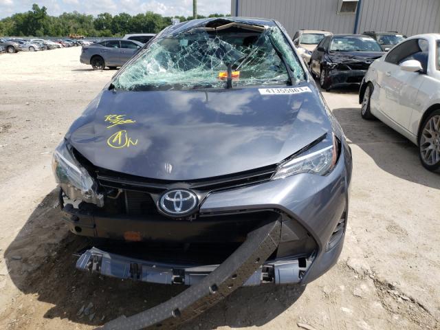 Photo 8 VIN: 5YFBURHE7KP904390 - TOYOTA COROLLA L 