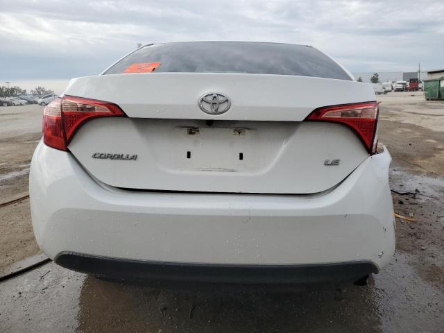 Photo 5 VIN: 5YFBURHE7KP904762 - TOYOTA COROLLA 