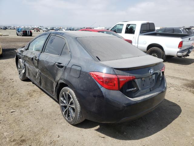 Photo 2 VIN: 5YFBURHE7KP910304 - TOYOTA COROLLA L 