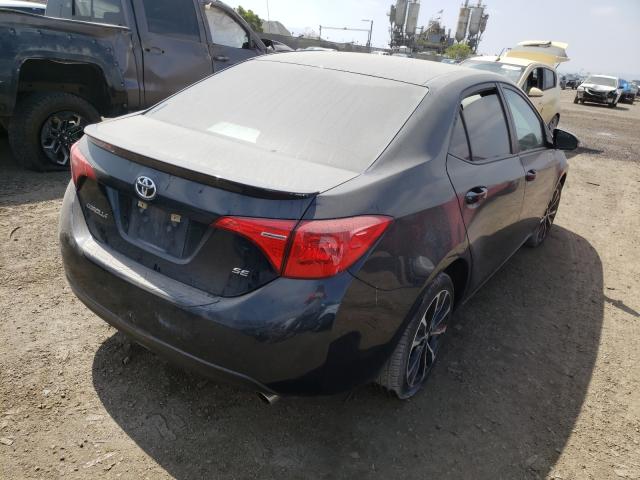 Photo 3 VIN: 5YFBURHE7KP910304 - TOYOTA COROLLA L 