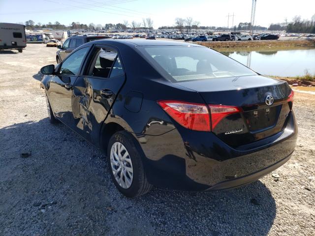 Photo 2 VIN: 5YFBURHE7KP910352 - TOYOTA COROLLA L 