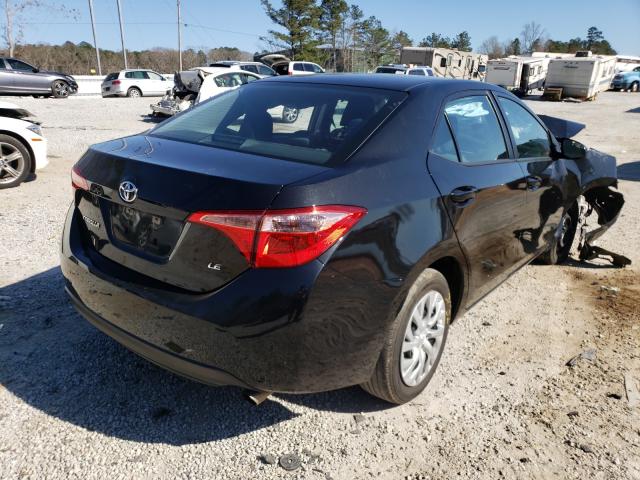 Photo 3 VIN: 5YFBURHE7KP910352 - TOYOTA COROLLA L 