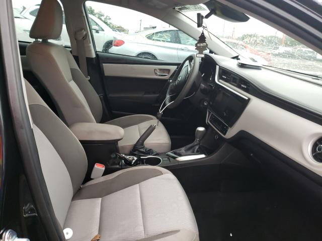 Photo 4 VIN: 5YFBURHE7KP910786 - TOYOTA COROLLA L 