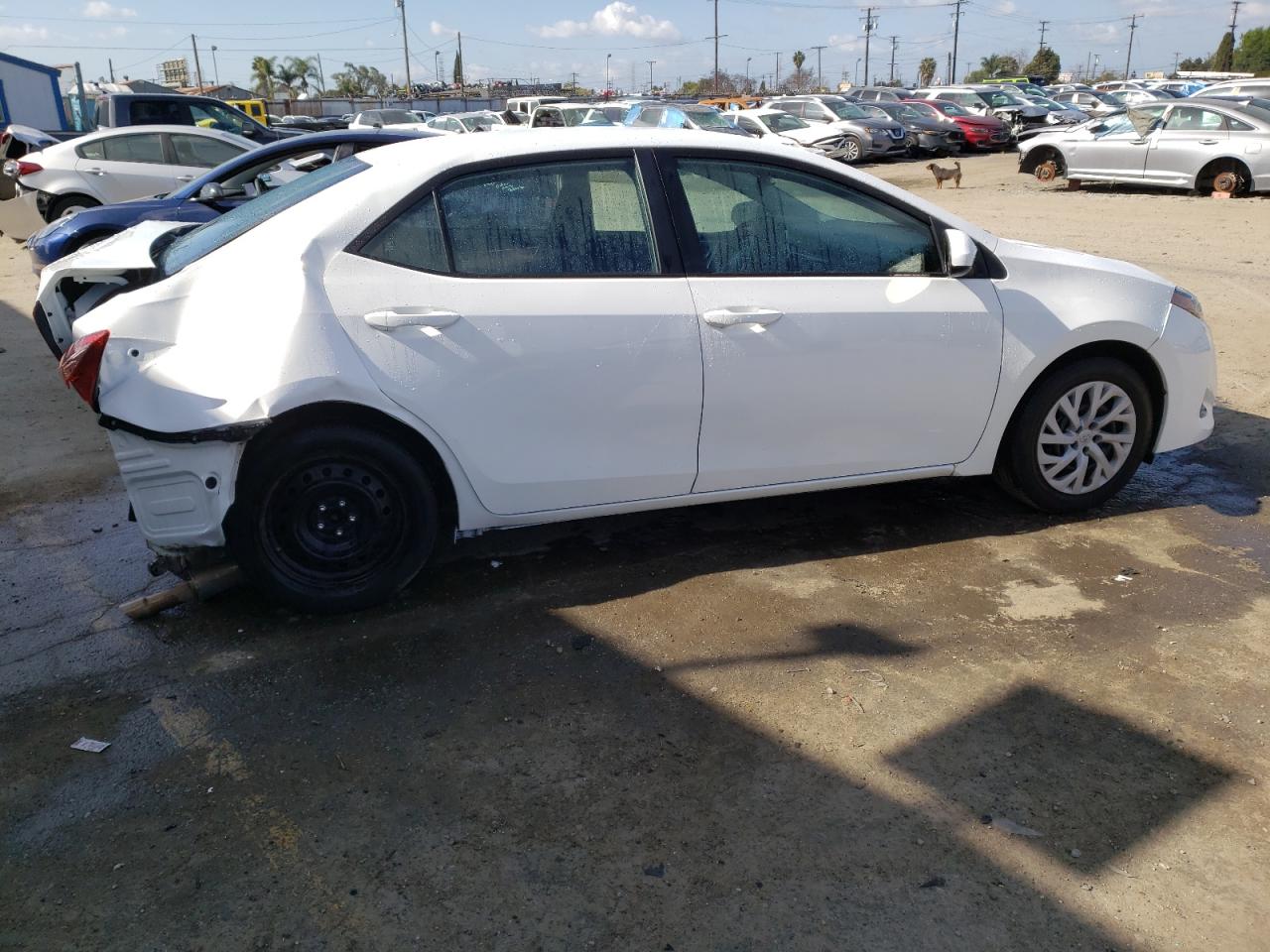 Photo 2 VIN: 5YFBURHE7KP913803 - TOYOTA COROLLA 