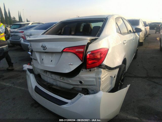 Photo 5 VIN: 5YFBURHE7KP920170 - TOYOTA COROLLA 