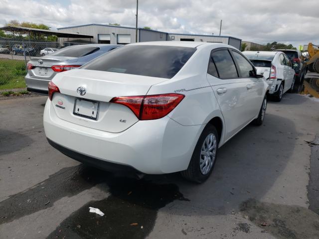 Photo 3 VIN: 5YFBURHE7KP933548 - TOYOTA COROLLA L 