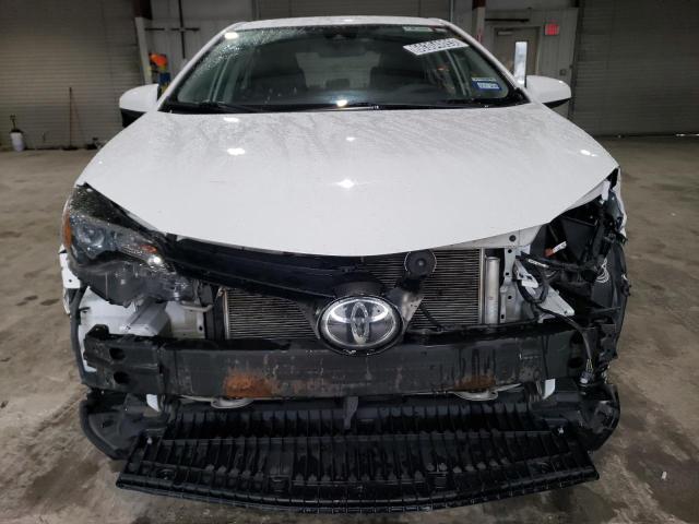 Photo 4 VIN: 5YFBURHE7KP940807 - TOYOTA COROLLA L 