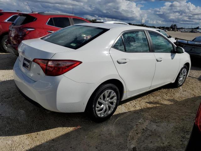 Photo 2 VIN: 5YFBURHE7KP942363 - TOYOTA COROLLA L 