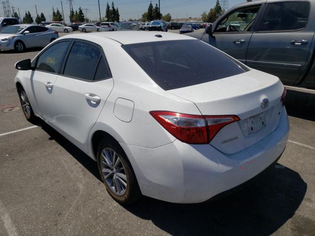 Photo 2 VIN: 5YFBURHE8EP005655 - TOYOTA COROLLA L 