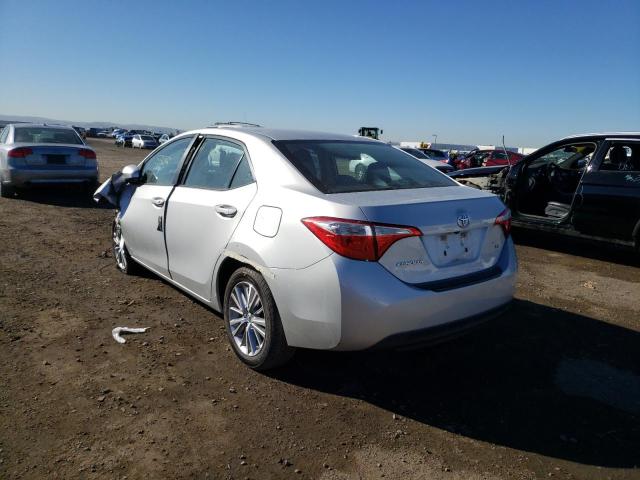 Photo 2 VIN: 5YFBURHE8EP106369 - TOYOTA COROLLA L 