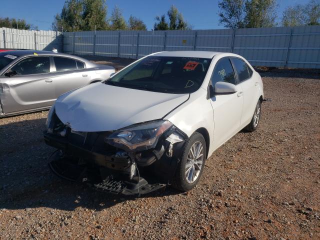 Photo 1 VIN: 5YFBURHE8FP212788 - TOYOTA COROLLA L 