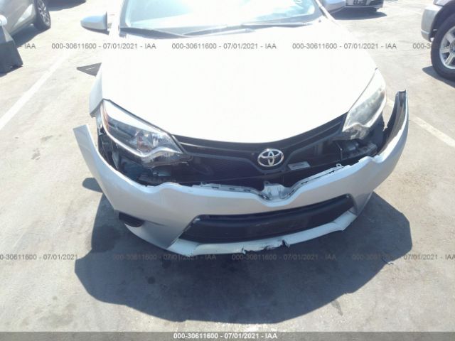 Photo 5 VIN: 5YFBURHE8GP395160 - TOYOTA COROLLA 