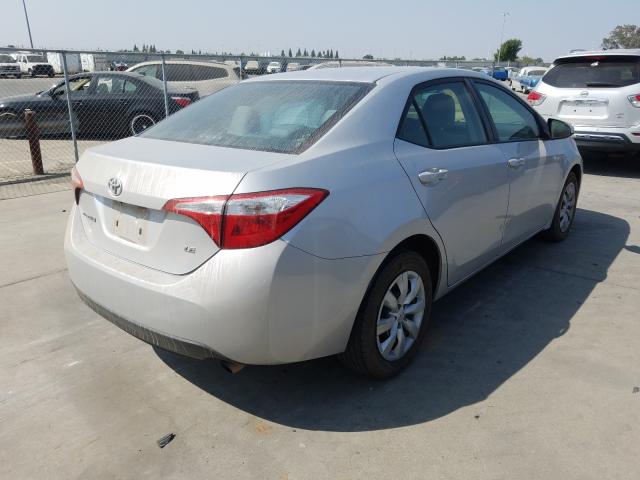 Photo 3 VIN: 5YFBURHE8GP399340 - TOYOTA COROLLA L 