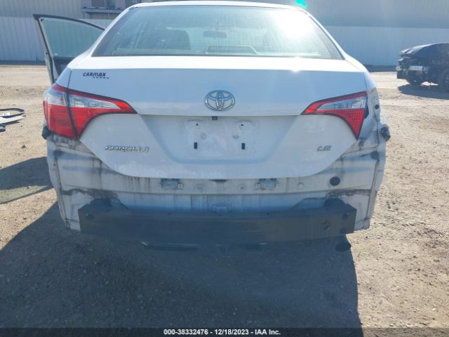 Photo 5 VIN: 5YFBURHE8GP409994 - TOYOTA COROLLA 