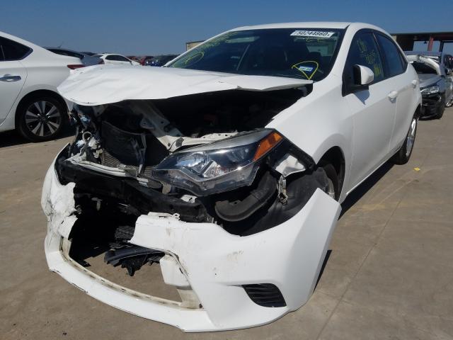 Photo 1 VIN: 5YFBURHE8GP515832 - TOYOTA COROLLA L 