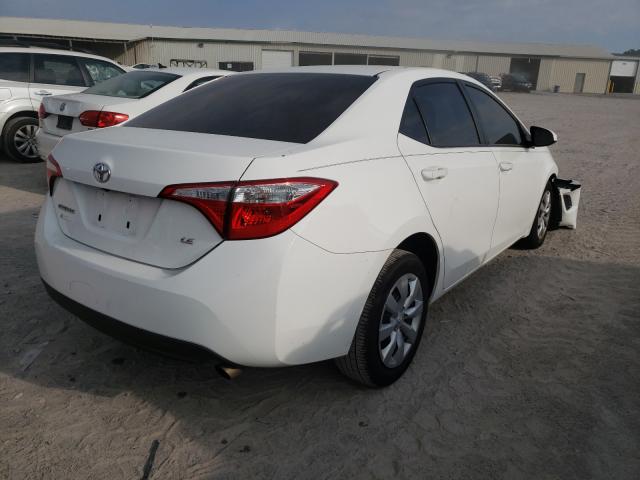 Photo 3 VIN: 5YFBURHE8GP524806 - TOYOTA COROLLA L 