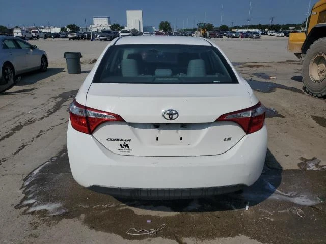 Photo 5 VIN: 5YFBURHE8GP533375 - TOYOTA COROLLA L 