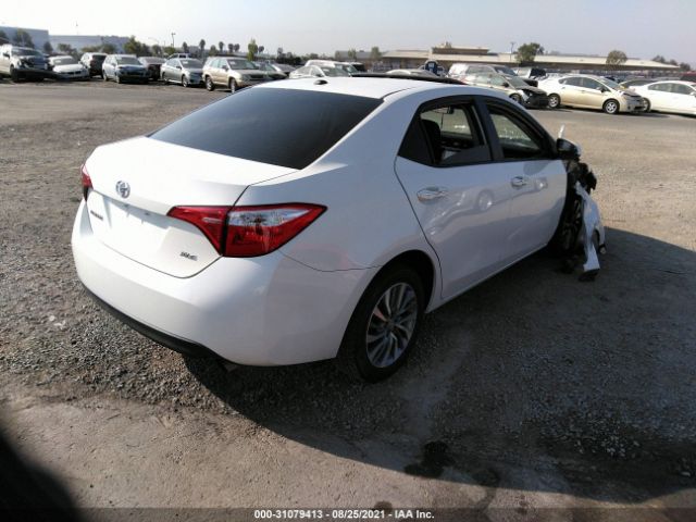 Photo 3 VIN: 5YFBURHE8HP593352 - TOYOTA COROLLA 