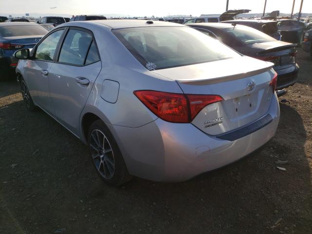 Photo 2 VIN: 5YFBURHE8HP599815 - TOYOTA COROLLA L 