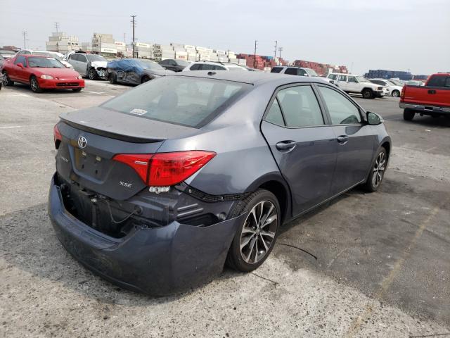 Photo 3 VIN: 5YFBURHE8HP601739 - TOYOTA COROLLA L 