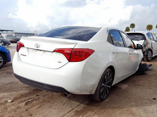 Photo 3 VIN: 5YFBURHE8HP611848 - TOYOTA COROLLA L 