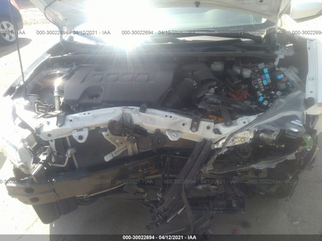 Photo 9 VIN: 5YFBURHE8HP617617 - TOYOTA COROLLA 