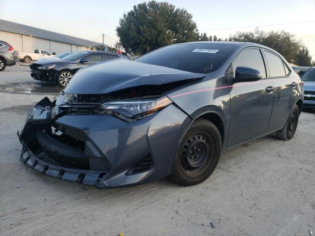 Photo 1 VIN: 5YFBURHE8HP663934 - TOYOTA COROLLA L 