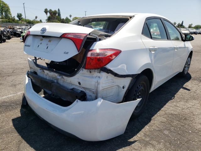 Photo 3 VIN: 5YFBURHE8HP688154 - TOYOTA COROLLA L 