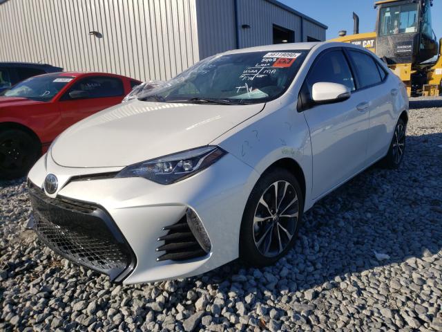 Photo 1 VIN: 5YFBURHE8HP688445 - TOYOTA COROLLA L 