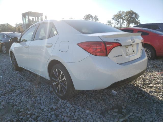 Photo 2 VIN: 5YFBURHE8HP688445 - TOYOTA COROLLA L 