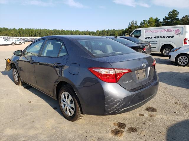 Photo 2 VIN: 5YFBURHE8HP692219 - TOYOTA COROLLA L 