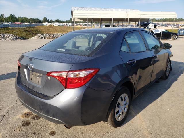 Photo 3 VIN: 5YFBURHE8HP692219 - TOYOTA COROLLA L 